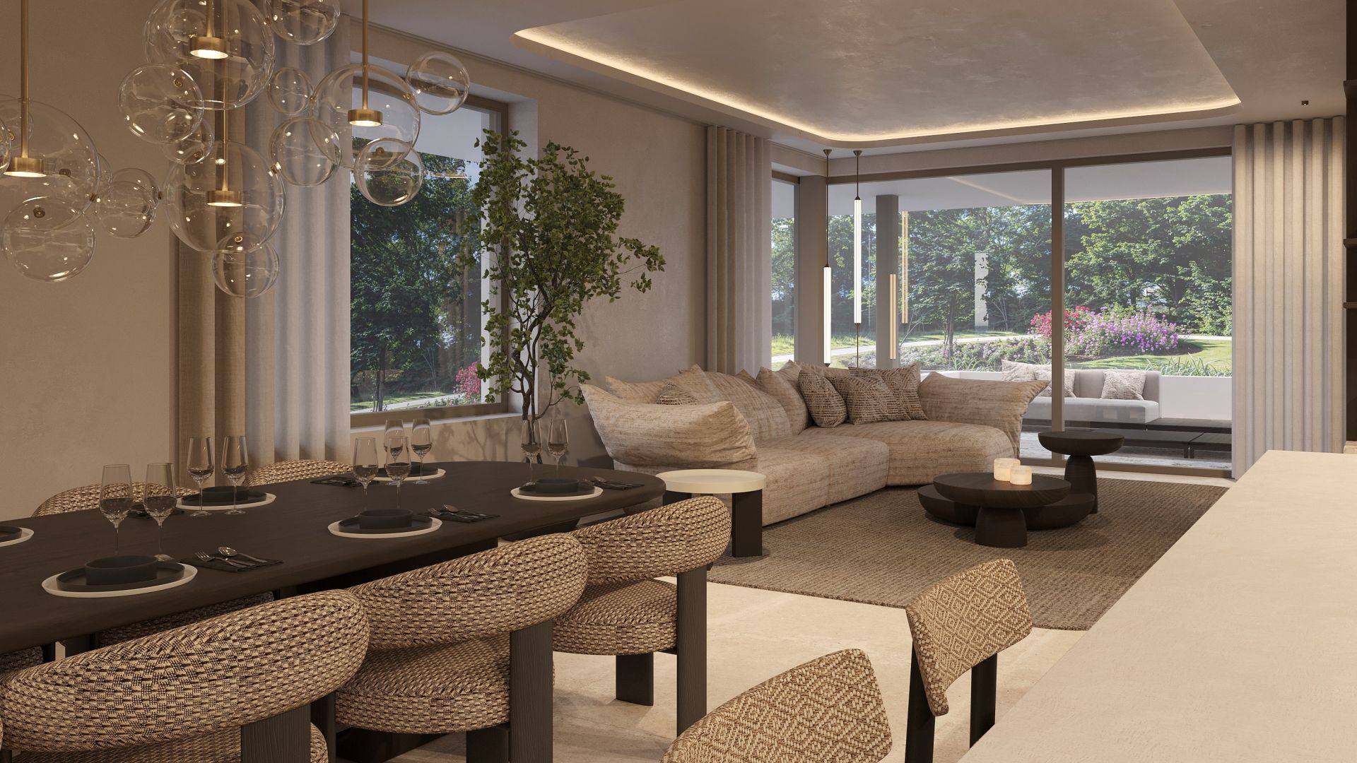 Een beschutte leefruimte op de begane grond van de West Residence, waar binnen en buiten naadloos overgaan in het groen.